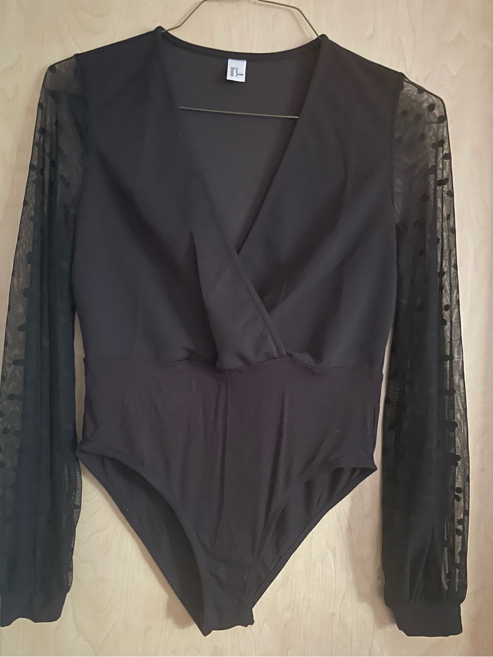 Amazon Black Long-Sleeve Wrap-Front Bodysuit with Sheer Dot Sleeves